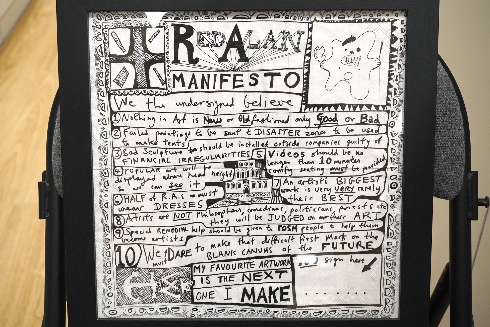 After Grayson Perry (b.1960), monochrome print on paper napkin, ‘Red Alan Manifesto’, 31 x 31cm. Condition - fair to good, central creases to paper